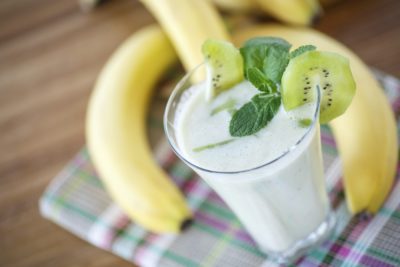 Tropical fruits smoothie with kiwi and banana
