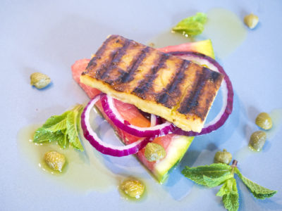 Vegan grileed feta on summery watermelon and caper salad