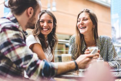 Group of friends having a coffee together