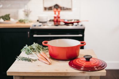 Dish and carrots on kitchen worktop