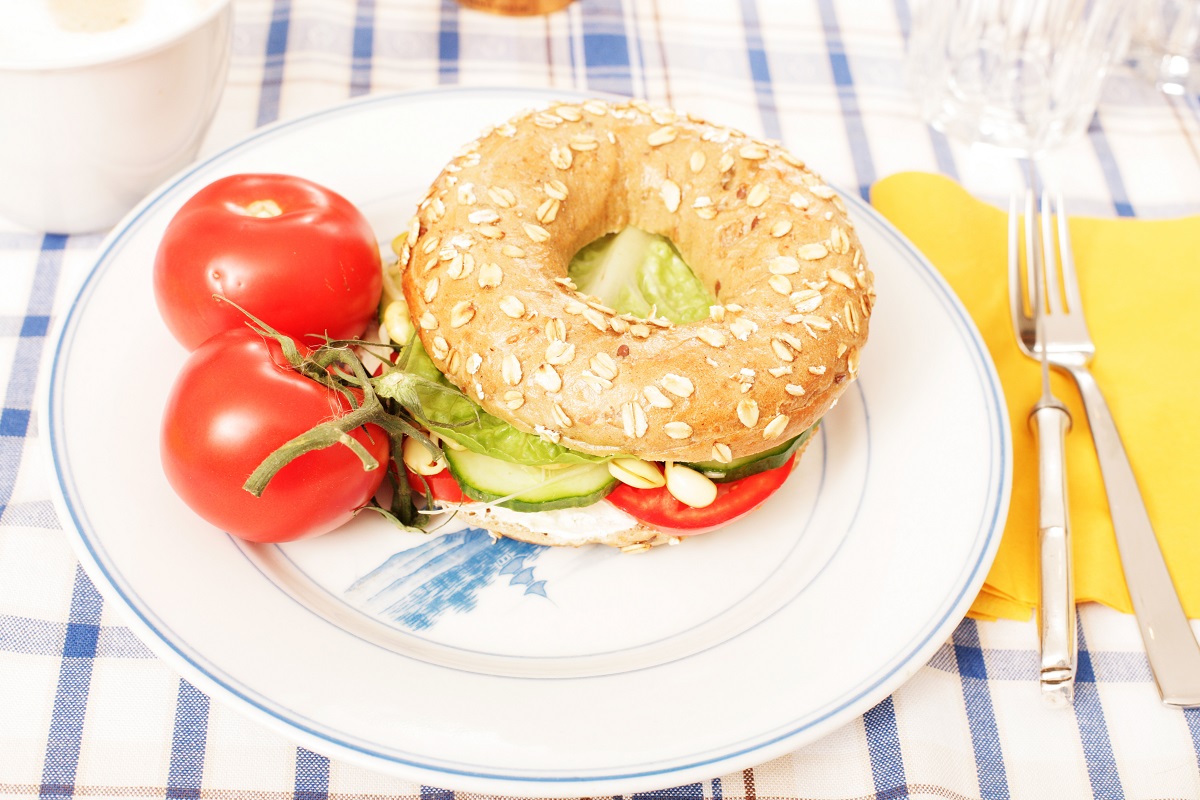Cream cheese bagel and tomato