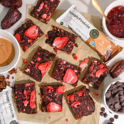 Stawberry chocolate bark cut into pieces on a table