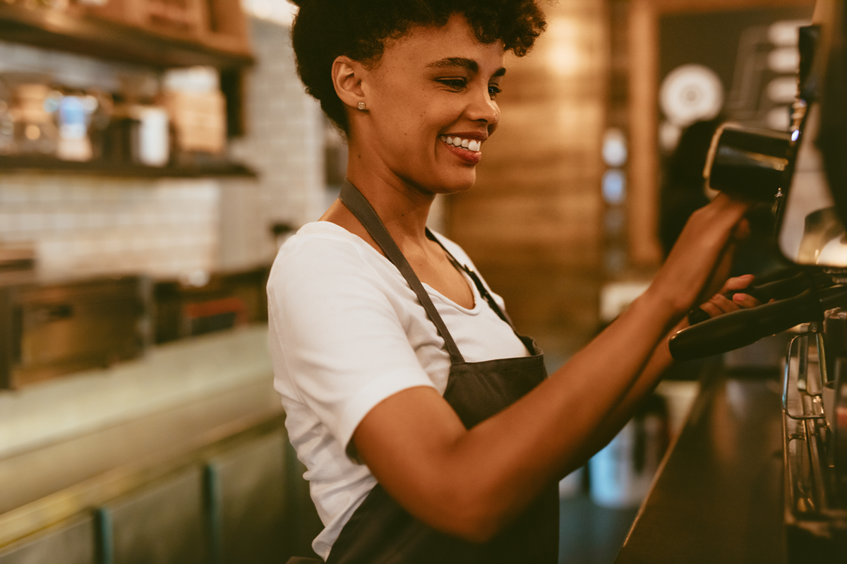Barista serving coffee