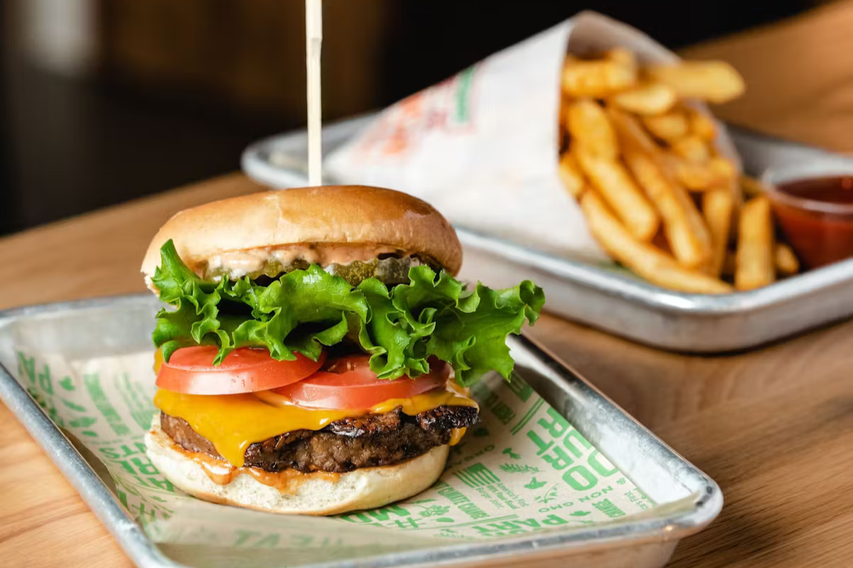sandwich sitting on top of a wooden table